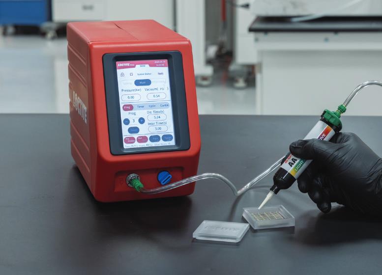 Pulse adhesive dispensing device
